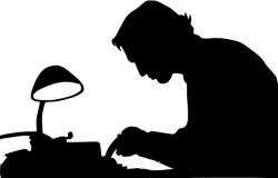 silhouette of writer working at a typewriter